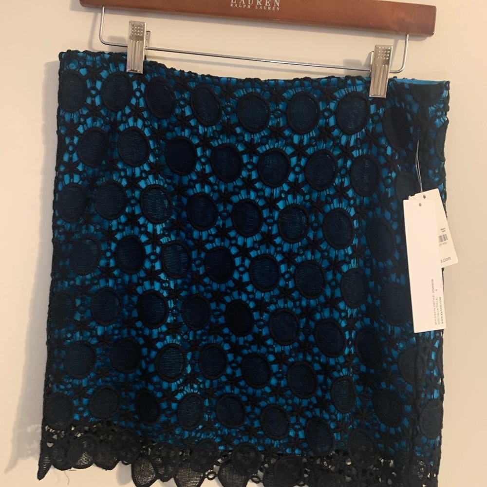 Blue and black lace mini skirt